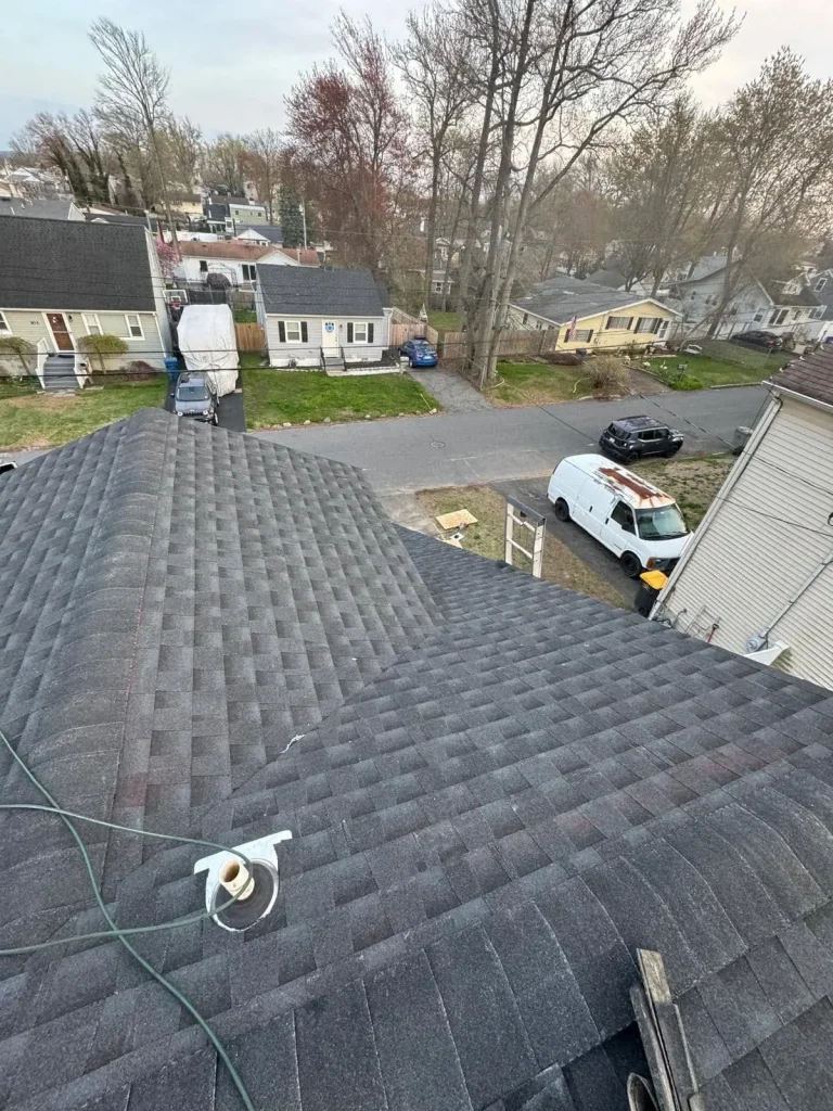 Finished architectural shingle roof seen from the ridge