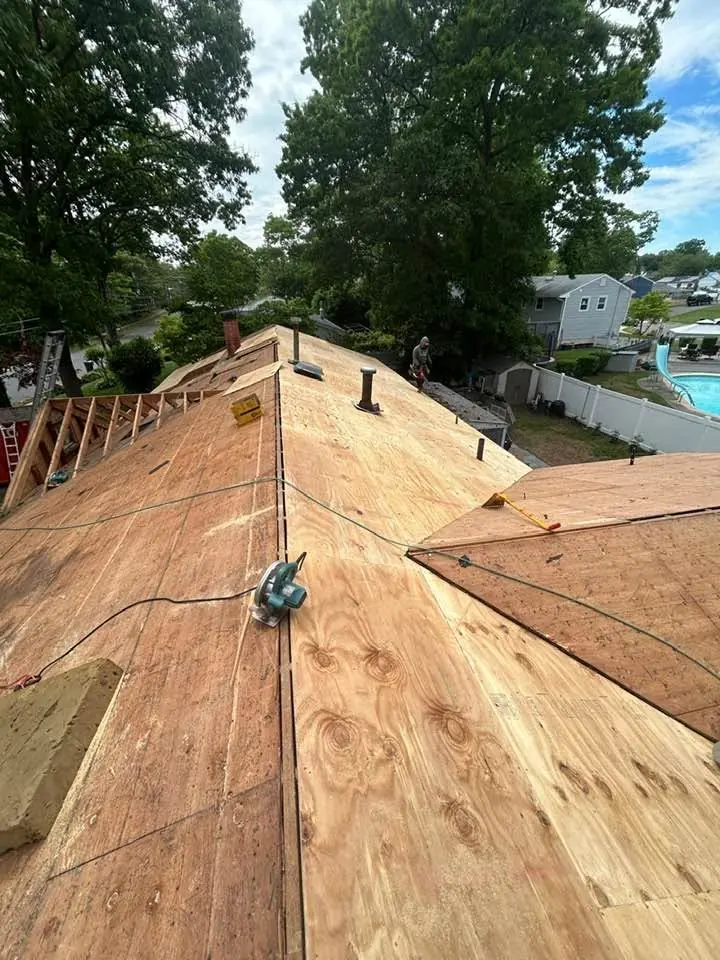 Freshly installed plywood roof deck ready for underlayment