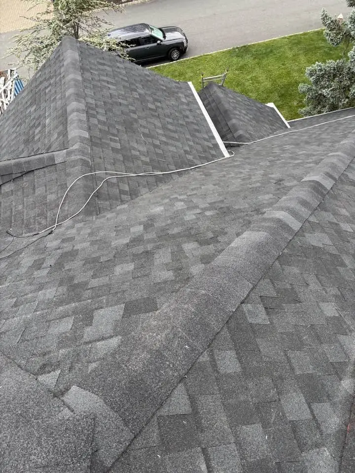 New shingle roof showing clean valleys and hips